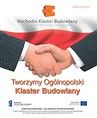 uścisk dłoni i napis tworzymy ogólnopolski klaster budowlany